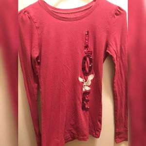 A pink love American eagle shirt